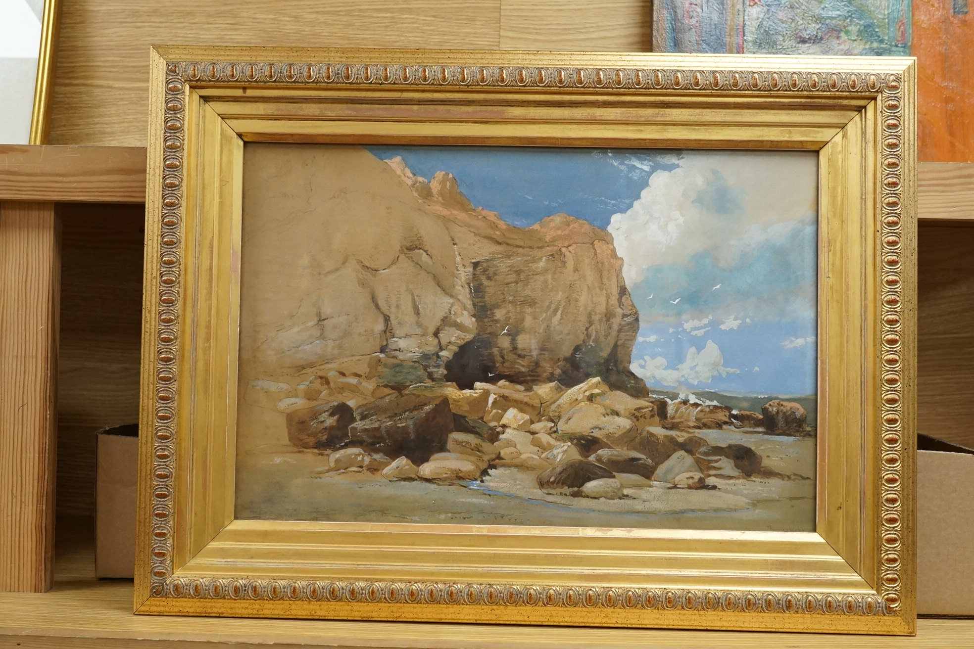 James Webb (1825-1895), heightened watercolour, Rocky coastal scene with cliffs and cave entrance, signed, 29 x 44cm, gilt framed. Condition - good